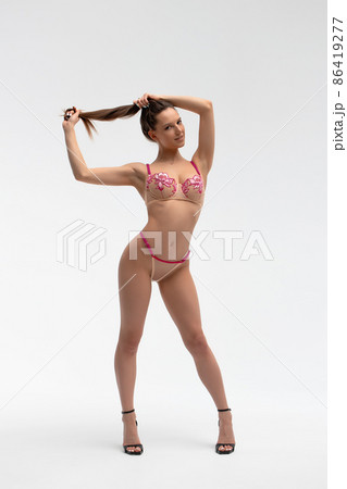 Erotic model in lingerie and high heels Erotic model in lingerie and high heels 86419277