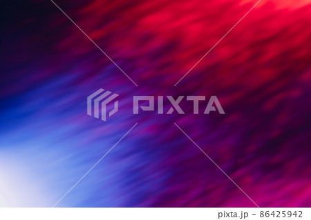 Defocused glow overlay. Neon radiance. Disco illumination. Blur led blue purple pink red white color light rays on dark black abstract background. Defocused glow overlay. Neon radiance. Disco illumination. Blur led blue purple pink red white color light rays on dark black abstract background. 86425942