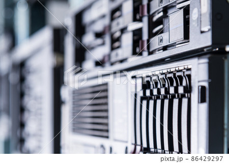Row of hard disks used for data storage in internet data center 86429297