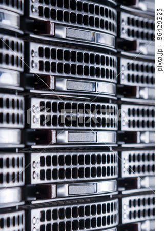 Row of hard disks used for data storage in internet data center Row of hard disks used for data storage in internet data center 86429325