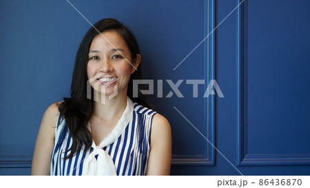 asian long hair mature adult working woman blue background smiling happy asian long hair mature adult working woman blue background smiling happy 86436870