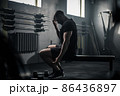 Male Take Break After Workout With Dumbbells . 86436897