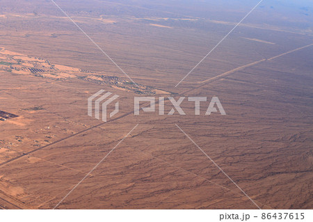 The Arizona desert from the sky 86437615