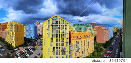 Street with colorful houses and beautiful exterior design in Kyiv, Ukraine. Aerial. Comfort town. Street with colorful houses and beautiful exterior design in Kyiv, Ukraine. Aerial. Comfort town. 86439794