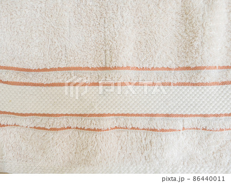 The detail of the soft cotton towel with the striped pattern. 86440011