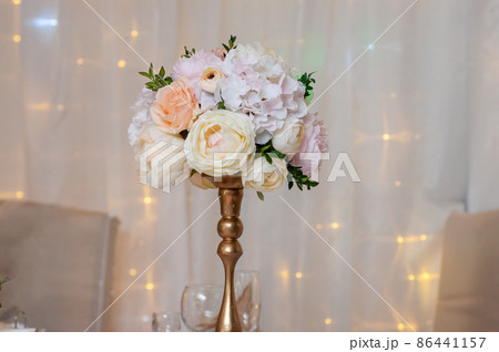 beautiful bouquet of flowers on a white background with lights beautiful bouquet of flowers on a white background with lights 86441157