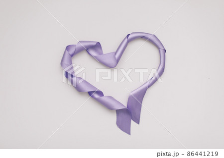 Heart shape made of ribbon on white background. Valentines and 8 March Mother Women's Day concept Heart shape made of ribbon on white background. Valentines and 8 March Mother Women's Day concept 86441219