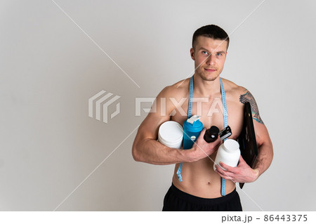 Fitness protein jars white on white background bodybuilder powder strong high back muscle, cramp sick man health medicine, illness Hold sickness, back suffer attractive 86443375
