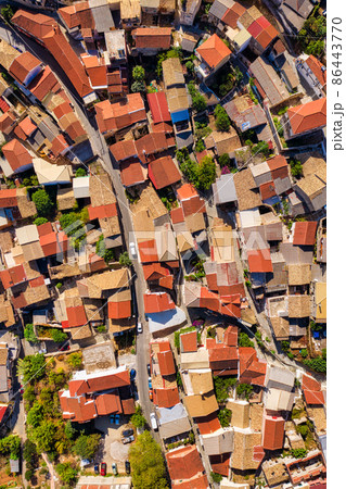 Aerial of red tiled roofs of old town in Mediterranean Aerial of red tiled roofs of old town in Mediterranean 86443770