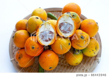 Betel nut in bamboo basket Betel nut in bamboo basket 86443946