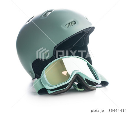 Ski or snowboarding helmet with goggles isolated on white background. Ski or snowboarding helmet with goggles isolated on white background. 86444414