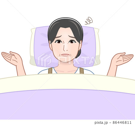 布団で横になっている女性 86446811