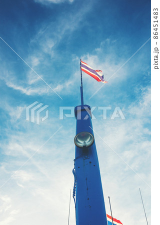 Thailand flag on wooden mast on boat floating sailing with spotlight 86451483