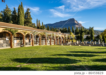 Detail on the christian graveyard with marble tombs and crosses in Jaca, Spain 86459829