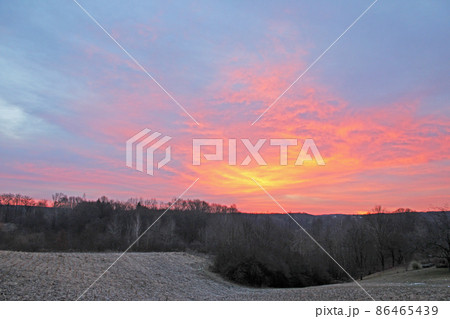 Winter mornings and the sky over the frozen countryside near Zagreb, Croatia 86465439