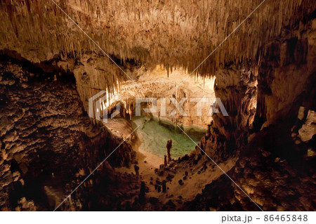 Incide the dragon caves with underground lake on island Majorca, Spain. Incide the dragon caves with underground lake on island Majorca, Spain. 86465848