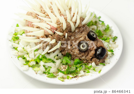 Traditional German dish called Mettigel,.Mett served as a Mett hedgehog Traditional German dish called Mettigel,.Mett served as a Mett hedgehog 86466341