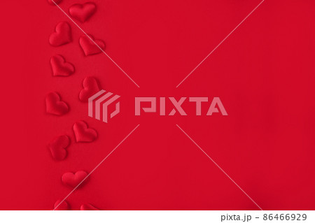 Festive St. Valentines background with red hearts on red background with copy space. St.Valentines day background for your project Festive St. Valentines background with red hearts on red background with copy space. St.Valentines day background for your project 86466929