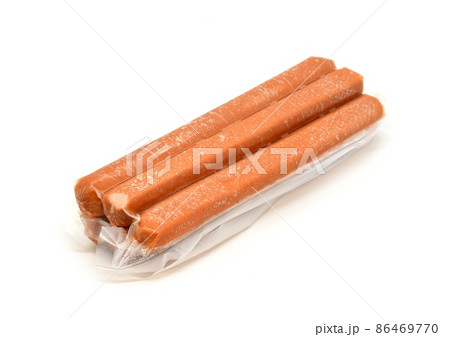 A vacuum pack of sausages on white background 86469770
