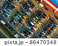 Aerial of full carpark near supermarket 86470348