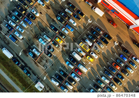 Aerial of full carpark near supermarket Aerial of full carpark near supermarket 86470348