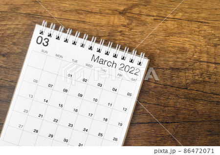 March 2022 desk calendar on wooden background. March 2022 desk calendar on wooden background. 86472071