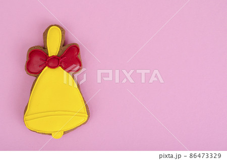 Homemade gingerbread with icing in shape of bells. Homemade gingerbread with icing in shape of bells. 86473329