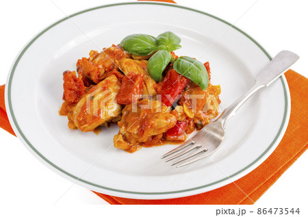 Chicken breast fillet braised with vegetables, paprika. 86473544