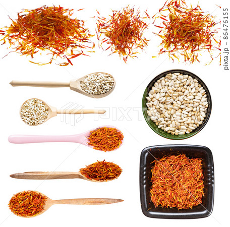 set of various safflower seeds and flower isolated set of various safflower seeds and flower isolated 86476155
