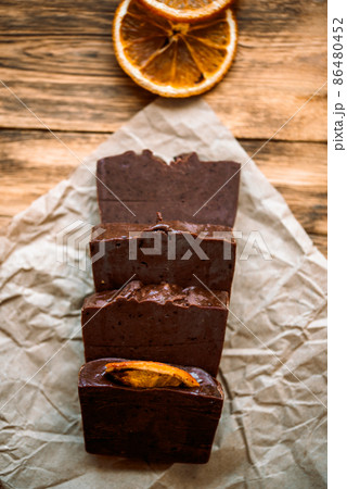 Dark chocolate, handmade sweet coffee soap, aromatic cinnamon and sweets. whole bean coffee Dark chocolate, handmade sweet coffee soap, aromatic cinnamon and sweets. whole bean coffee 86480452