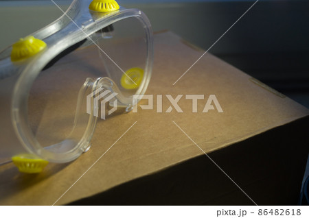 Safety glasses. Personal eye protection in production and construction. Soft focus, selective focus Safety glasses. Personal eye protection in production and construction. Soft focus, selective focus 86482618