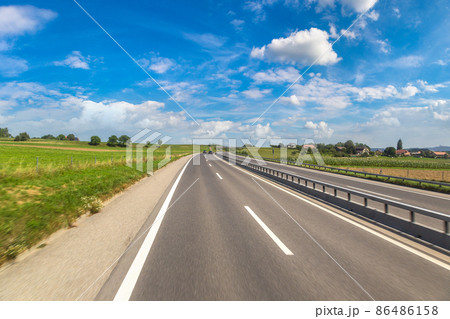 Asphalt road in Switzerland Asphalt road in Switzerland 86486158
