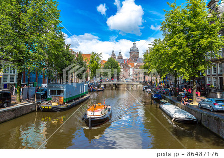 Canal and St. Nicolas Church in Amsterdam Canal and St. Nicolas Church in Amsterdam 86487176