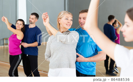Mature woman learning to dance kizomba 86488536