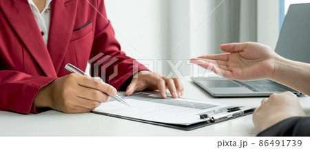 Business people hold a resume and talk to work applicants for work interviews about careers and Their personal history in the company. Recruitment concepts Business people hold a resume and talk to work applicants for work interviews about careers and Their personal history in the company. Recruitment concepts 86491739