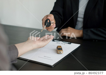 The car dealer provides advice on loans, insurance details, and car rental information, and delivers the car with the keys after the rental contract is signed The car dealer provides advice on loans, insurance details, and car rental information, and delivers the car with the keys after the rental contract is signed 86492377