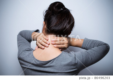 Woman has neck pain 86496203