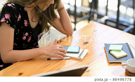 Close-up image, An asian female using smartphone Close-up image, An asian female using smartphone 86496778