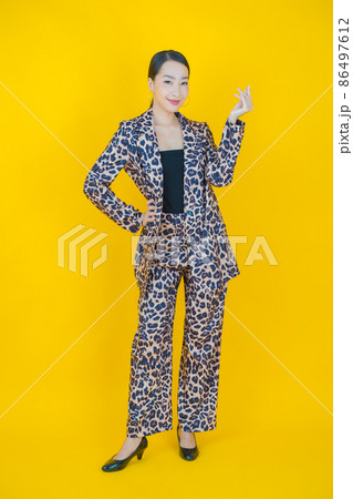 Portrait beautiful young asian woman smile with action Portrait beautiful young asian woman smile with action 86497612