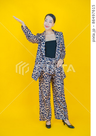 Portrait beautiful young asian woman smile with action Portrait beautiful young asian woman smile with action 86497615