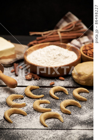 Cooking traditional German or Austrian Vanillekipferl vanilla kipferl cookies Cooking traditional German or Austrian Vanillekipferl vanilla kipferl cookies 86498227