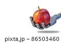 fingers squeeze a fresh apple in the robots hand. future technologies and ecology. robotics applicable in agriculture  86503460