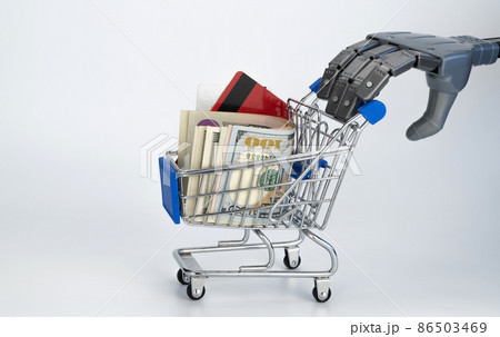 robot arm pushes a supermarket cart. white background, free space. technology future, artificial intelligence in trade robot arm pushes a supermarket cart. white background, free space. technology future, artificial intelligence in trade 86503469