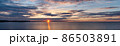 Sunset on lake with waves and cloudy sky landscape 86503891