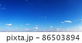 Clear blue sky with small clouds in summer day 86503894