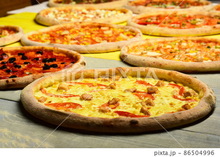 Take away food with various ingredients and crunchy edges. Take away food with various ingredients and crunchy edges. 86504996