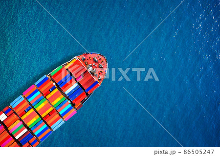 Aerial view of container cargo ship in sea. Aerial view of container cargo ship in sea. 86505247