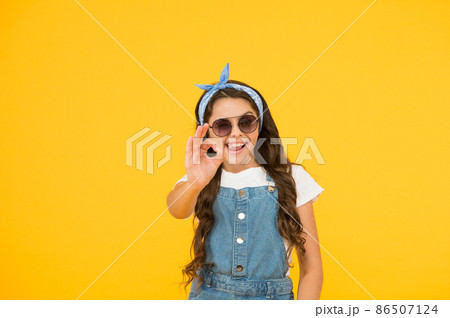 Alright. Summer vacation concept. Girl long curly hair 86507124