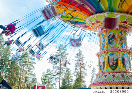 Kouvola, Finland 7 June 2016 - Ride Swing Carousel in motion in amusement park Tykkimaki Kouvola, Finland 7 June 2016 - Ride Swing Carousel in motion in amusement park Tykkimaki 86508996