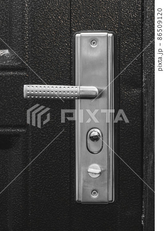 Metal door handle necessity of repair and reconstruction of the door, wall of the premises of unfinished apartment Metal door handle necessity of repair and reconstruction of the door, wall of the premises of unfinished apartment 86509120